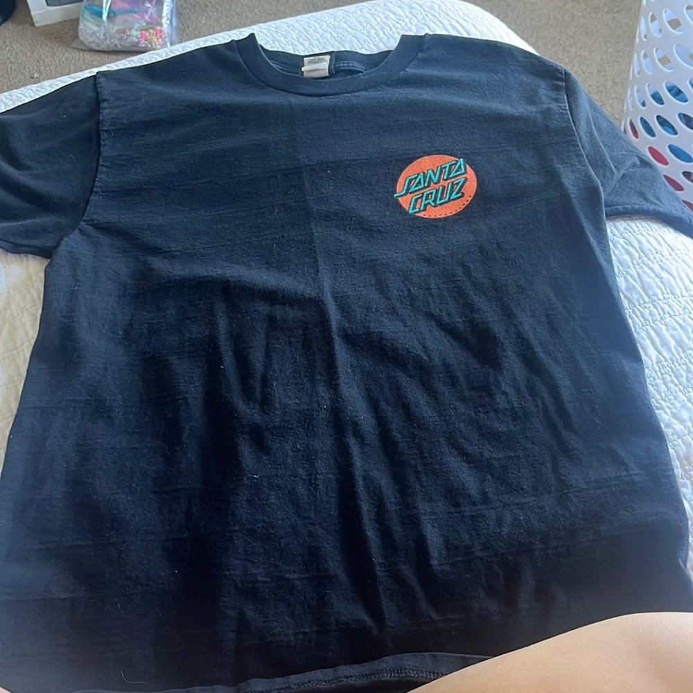 full length black Santa Cruz tshirt